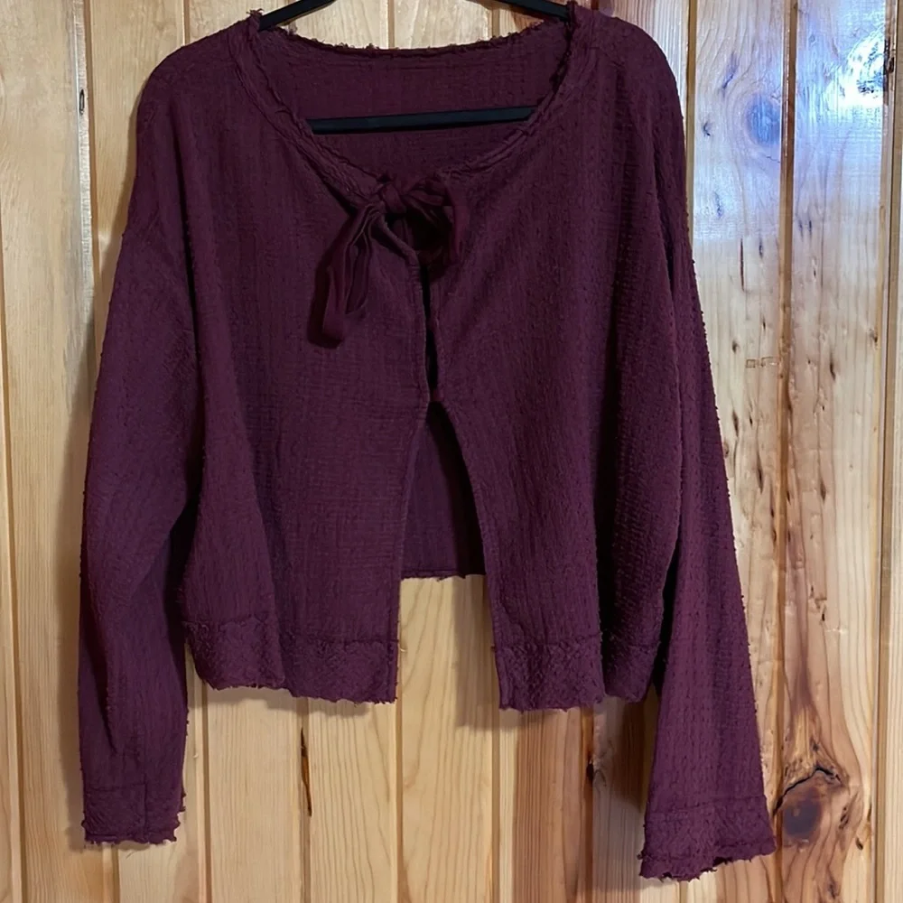 Free People Walking in Hueco Back Tie Long Sleeve Raspberry Cropped Top.